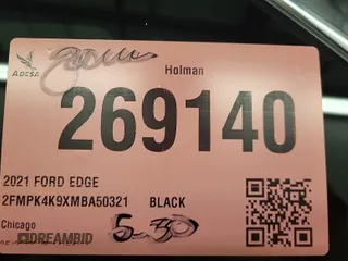 2021 Ford Edge Titanium z VIN 2FMPK4K9XMBA50321, wystawiony jako IAAI lot #42479453 z przebiegiem 86 405 mil mil oraz . Historia ofert i sprzedaży dostępna na DreamBid. Obrazek 1.