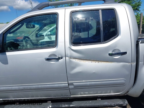 2011 Nissan Frontier Pro-4X with VIN 1N6AD0EV0BC408218, listed as a IAAI auction lot 42187823 with 165,995 mi miles and . Bid and sale history available at DreamBid. Image 14.