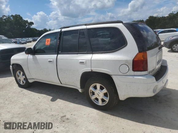 2005 GMC Envoy SLT with VIN 1GKDT13S052311455, listed as a Copart auction lot 73635434 with Not Provided miles and Salvage Title. Bid and sale history available at DreamBid. Image 2.