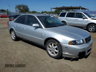1999 Audi A4 with VIN WAUBB28DXXA299469, listed as a Copart auction lot 65596934 with 207,289 mi miles and Salvage Title. Bid and sale history available at carsss.com. Image 4.