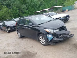 2014 Hyundai Accent GS with VIN KMHCT5AE3EU181067, listed as a IAAI auction lot 42180136 with 90,285 mi miles and . Bid and sale history available at DreamBid. Image 1.