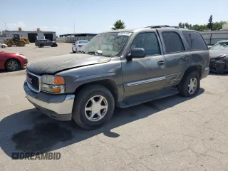 2001 GMC Yukon SLE z VIN 1GKEC13T21R193486, wystawiony jako Copart lot #59224145 z przebiegiem 228 384 mil mil oraz Szkoda całkowita • Salvage title. Historia ofert i sprzedaży dostępna na DreamBid. Obrazek 1.