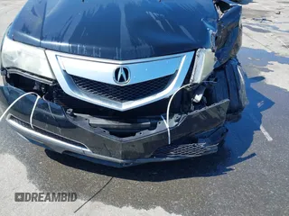 2012 Acura MDX with VIN 2HNYD2H25CH502313, listed as a IAAI auction lot 42542097 with 152,657 mi miles and . Bid and sale history available at DreamBid. Image 17.