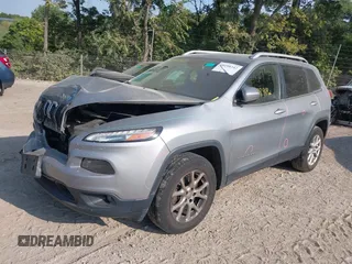 2016 Jeep Cherokee Altitude with VIN 1C4PJMCB0GW108819, listed as a IAAI auction lot 40198342 with 128,949 mi miles and . Bid and sale history available at DreamBid. Image 2.