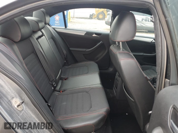 2014 Volkswagen Jetta GLI z VIN 3VW4T7AJ2EM245201, wystawiony jako Copart lot #64901935 z przebiegiem 147 799 mil mil oraz Czysty tytuł • Clean title. Historia ofert i sprzedaży dostępna na DreamBid. Obrazek 10.