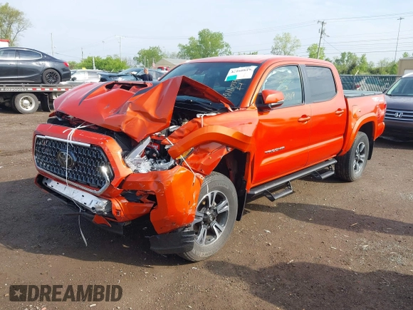 2018 Toyota Tacoma SR with VIN 3TMCZ5AN2JM131276, listed as a IAAI auction lot 42160819 with 46,044 mi miles and . Bid and sale history available at carsss.com. Image 2.