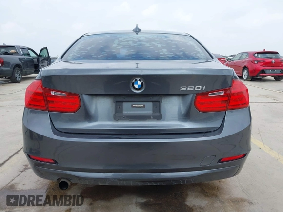 2013 BMW 3 Series 320i with VIN WBA3B1C53DK128602, listed as a IAAI auction lot 41952771 with 103,564 mi miles and . Bid and sale history available at carsss.com. Image 17.