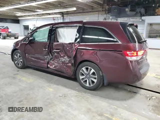 2014 Honda Odyssey Touring with VIN 5FNRL5H93EB079817, listed as a Copart auction lot 56231645 with 65,521 mi miles and Salvage title. Bid and sale history available at DreamBid. Image 2.