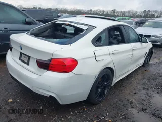 2016 BMW 4 Series 428i xDrive with VIN WBA4C9C57GG141554, listed as a IAAI auction lot 41988753 with Not Provided miles. Bid and sale history available at carsss.com. Image 4.