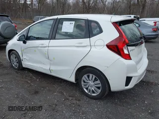 2017 Honda Fit LX with VIN JHMGK5H58HS021117, listed as a IAAI auction lot 42026243 with 94,953 mi miles. Bid and sale history available at carsss.com. Image 3.