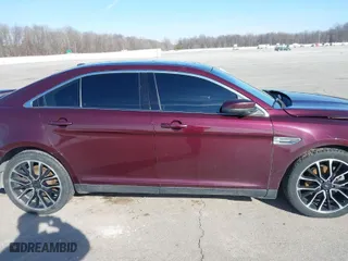 2018 Ford Taurus SEL with VIN 1FAHP2E84JG113599, listed as a IAAI auction lot 41526343 with 105,798 mi miles. Bid and sale history available at carsss.com. Image 14.