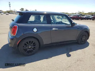 2014 MINI Hardtop S with VIN WMWXM7C54ET985344, listed as a Copart auction lot 55242945 with 87,017 mi miles and Salvage Title. Bid and sale history available at DreamBid. Image 3.