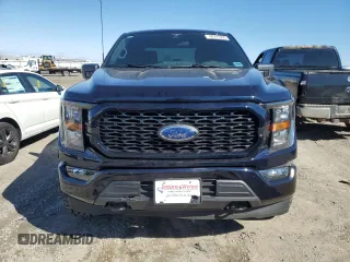 2023 Ford F-150 XL with VIN 1FTFW1E55PKD59670, listed as a Copart auction lot 48297005 with 20,668 mi miles and Salvage Title. Bid and sale history available at carsss.com. Image 5.