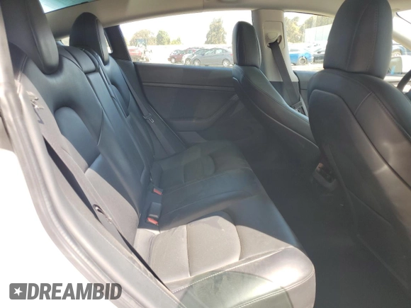 2021 Tesla Model 3 Standard Range Plus z VIN 5YJ3E1EA7MF078241, wystawiony jako Copart lot #57100525 z przebiegiem 56 700 mil mil oraz Szkoda całkowita • Salvage title. Historia ofert i sprzedaży dostępna na DreamBid. Obrazek 7.