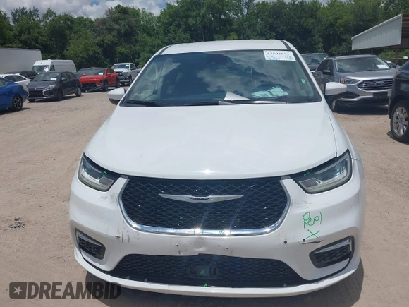 2023 Chrysler Pacifica Hybrid Touring L with VIN 2C4RC1L71PR622474, listed as a IAAI auction lot 42595061 with 55,880 mi miles and . Bid and sale history available at DreamBid. Image 12.