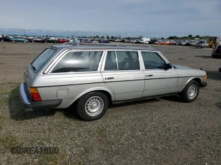 1985 Mercedes-Benz 300 with VIN WDBAB93C5FF030673, listed as a Copart auction lot 52360325 with 171,214 mi miles and Clean Title. Bid and sale history available at DreamBid. Image 3.