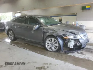2012 Ford Taurus Limited with VIN 1FAHP2FW3CG113920, listed as a Copart auction lot 55565615 with 131,981 mi miles and Salvage title. Bid and sale history available at DreamBid. Image 4.