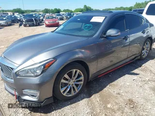 2015 Infiniti M Hybrid with VIN JN1EY1AP2FM510029, listed as a IAAI auction lot 41795913 with 152,475 mi miles. Bid and sale history available at carsss.com. Image 2.