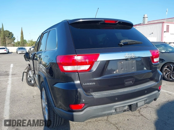 2013 Jeep Grand Cherokee Laredo with VIN 1C4RJEAG2DC643290, listed as a IAAI auction lot 41751696 with 125,258 mi miles. Bid and sale history available at carsss.com. Image 3.