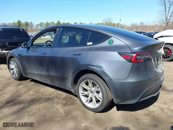 2023 Tesla Model Y Long Range with VIN 7SAYGDEEXPA175104, listed as a IAAI auction lot 41821928 with 52,791 mi miles. Bid and sale history available at carsss.com. Image 14.
