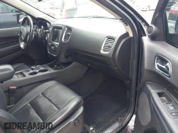 2014 Dodge Durango Citadel with VIN 1C4RDJEGXEC524883, listed as a IAAI auction lot 42357919 with 205,100 mi miles and . Bid and sale history available at DreamBid. Image 5.