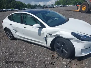 2023 Tesla Model 3 z VIN 5YJ3E1EA2PF626392, wystawiony jako IAAI lot #42288413 z przebiegiem 25 605 mil mil oraz . Historia ofert i sprzedaży dostępna na DreamBid. Obrazek 6.