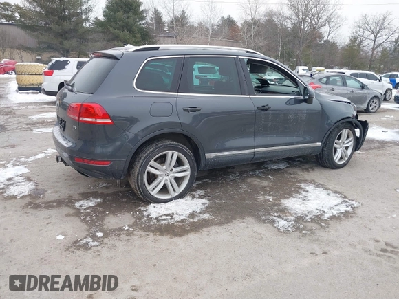 2012 Volkswagen Touareg Sport z VIN WVGEF9BP4CD008517, wystawiony jako IAAI lot #41386971 z przebiegiem 179 306 mil mil oraz . Historia ofert i sprzedaży dostępna na DreamBid. Obrazek 4.