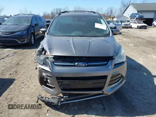 2013 Ford Escape SEL with VIN 1FMCU9H98DUB89046, listed as a IAAI auction lot 41794795 with 89,819 mi miles and . Bid and sale history available at DreamBid. Image 12.