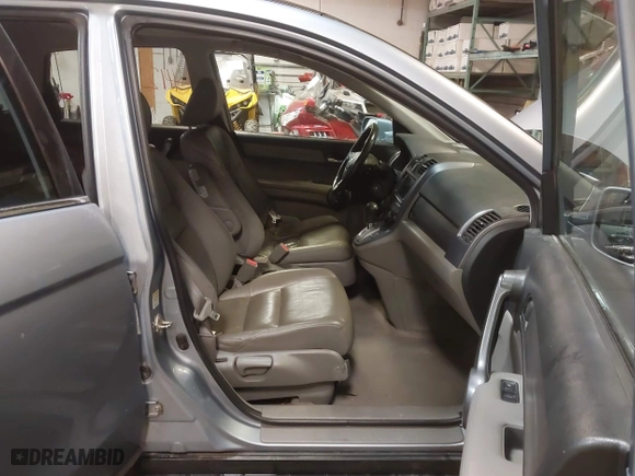 2009 Honda CR-V EX-L with VIN 5J6RE48739L037292, listed as a IAAI auction lot 41121290 with 150,597 mi miles. Bid and sale history available at carsss.com. Image 5.