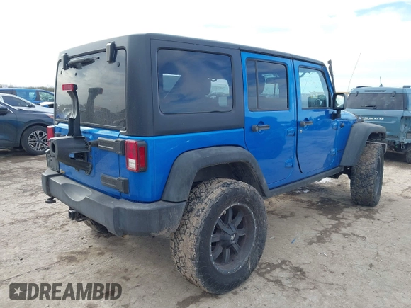 2015 Jeep Wrangler Unlimited Rubicon with VIN 1C4BJWFG5FL558348, listed as a IAAI auction lot 41460025 with 106,012 mi miles. Bid and sale history available at carsss.com. Image 4.