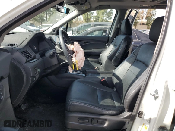 2021 Honda Pilot Elite with VIN 5FNYF6H02MB029791, listed as a Copart auction lot 42829435 with 54,403 mi miles and Salvage Title. Bid and sale history available at DreamBid. Image 7.