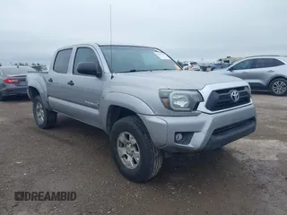 2014 Toyota Tacoma PreRunner with VIN 3TMJU4GN7EM165548, listed as a IAAI auction lot 41803994 with 215,687 mi miles and . Bid and sale history available at DreamBid. Image 1.
