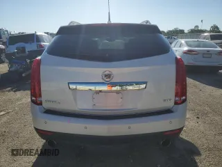 2014 Cadillac SRX Premium Collection z VIN 3GYFNGE34ES662777, wystawiony jako Copart lot #56559285 z przebiegiem 131 136 mil mil oraz Szkoda całkowita • Salvage title. Historia ofert i sprzedaży dostępna na DreamBid. Obrazek 6.