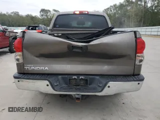 2007 Toyota Tundra Limited z VIN 5TBEV58137S457418, wystawiony jako Copart lot #77690584 z przebiegiem 233 237 mil mil oraz Szkoda całkowita • Salvage title. Historia ofert i sprzedaży dostępna na DreamBid. Obrazek 6.