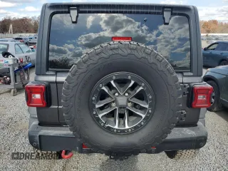 2024 Jeep Wrangler Rubicon X with VIN 1C4RJXFG2RW153197, listed as a Copart auction lot 76521384 with 3,897 mi miles and Salvage title. Bid and sale history available at DreamBid. Image 6.