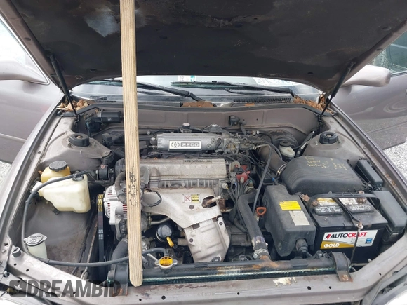 1994 Toyota Camry LE z VIN 4T1SK12E0RU463582, wystawiony jako IAAI lot #41823733 z przebiegiem 120 050 mil mil oraz . Historia ofert i sprzedaży dostępna na DreamBid. Obrazek 10.