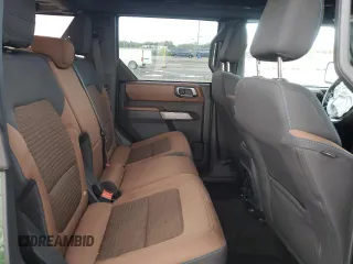 2023 Ford Bronco z VIN 1FMEE5BP1PLB18612, wystawiony jako Copart lot #53937575 z przebiegiem 28 536 mil mil oraz Szkoda całkowita • Salvage title. Historia ofert i sprzedaży dostępna na DreamBid. Obrazek 11.