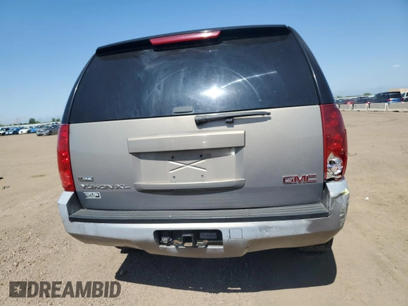 2007 GMC Yukon XL SLT z VIN 1GKFK16317J189987, wystawiony jako Copart lot #62029895 z przebiegiem 192 166 mil mil oraz Czysty tytuł • Clean title. Historia ofert i sprzedaży dostępna na DreamBid. Obrazek 6.