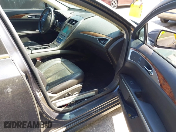 2014 Lincoln MKZ with VIN 3LN6L2GK9ER818561, listed as a IAAI auction lot 42063387 with 143,803 mi miles. Bid and sale history available at carsss.com. Image 5.