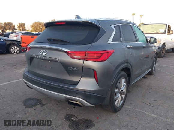 2021 Infiniti QX50 Luxe with VIN 3PCAJ5BA9MF124179, listed as a IAAI auction lot 42296244 with 79,935 mi miles and . Bid and sale history available at DreamBid. Image 4.