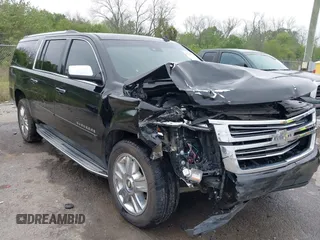 2015 Chevrolet Suburban LTZ with VIN 1GNSCKKC6FR271675, listed as a IAAI auction lot 41915036 with 150,917 mi miles. Bid and sale history available at carsss.com. Image 1.