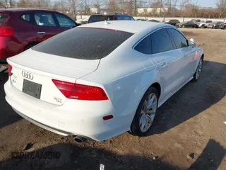 2013 Audi A7 3.0 Prestige with VIN WAU3GAFC6DN063674, listed as a IAAI auction lot 41801556 with 135,913 mi miles. Bid and sale history available at carsss.com. Image 4.