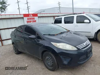 2012 Ford Fiesta SE z VIN 3FADP4BJ8CM173590, wystawiony jako IAAI lot #40732721 z przebiegiem 156 874 mil mil oraz . Historia ofert i sprzedaży dostępna na DreamBid. Obrazek 1.