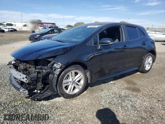 2021 Toyota Corolla Hatchback SE with VIN JTND4MBE4M3115822, listed as a Copart auction lot 77622034 with 83,268 mi miles and Salvage Title. Bid and sale history available at carsss.com. Image 1.