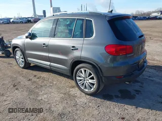 2012 Volkswagen Tiguan SEL with VIN WVGAV7AX2CW000962, listed as a IAAI auction lot 40815475 with 162,859 mi miles and . Bid and sale history available at DreamBid. Image 3.