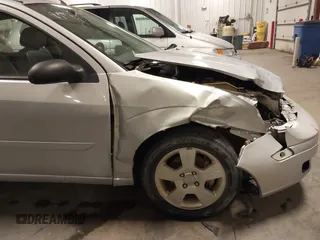 2007 Ford Focus S with VIN 1FAFP37NX7W330802, listed as a IAAI auction lot 41663895 with 147,015 mi miles and . Bid and sale history available at carsss.com. Image 18.