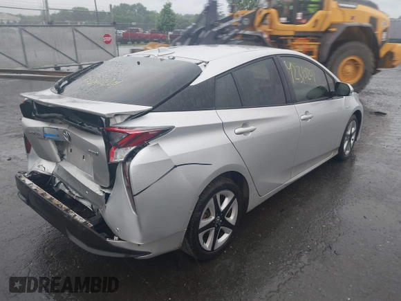 2017 Toyota Prius Two with VIN JTDKARFU4H3043433, listed as a IAAI auction lot 42310201 with 50,715 mi miles and . Bid and sale history available at DreamBid. Image 4.