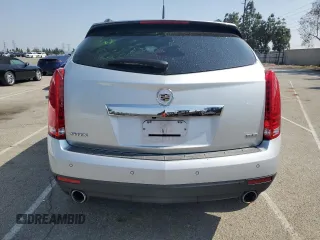 2013 Cadillac SRX Performance Collection z VIN 3GYFNDE38DS561321, wystawiony jako Copart lot #60237605 z przebiegiem 120 404 mil mil oraz Szkoda całkowita • Salvage title. Historia ofert i sprzedaży dostępna na DreamBid. Obrazek 6.