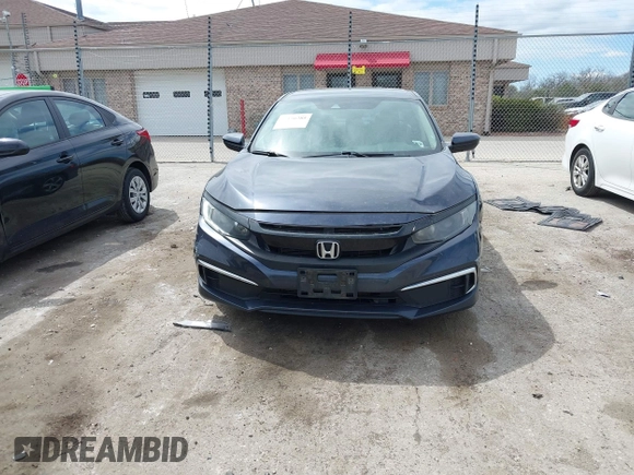 2019 Honda Civic LX with VIN 2HGFC2F61KH564474, listed as a IAAI auction lot 42156385 with 239,694 mi miles and . Bid and sale history available at DreamBid. Image 12.