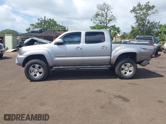 2014 Toyota Tacoma with VIN 3TMLU4EN3EM159080, listed as a IAAI auction lot 41809259 with 113,950 mi miles and . Bid and sale history available at DreamBid. Image 14.